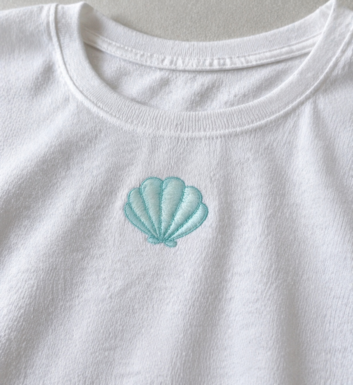 Blue Shell Embroidery Baby Tee